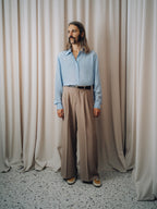 Gran Turismo Trousers in tortora, high-rise wide leg with a light blue shirt and black belt